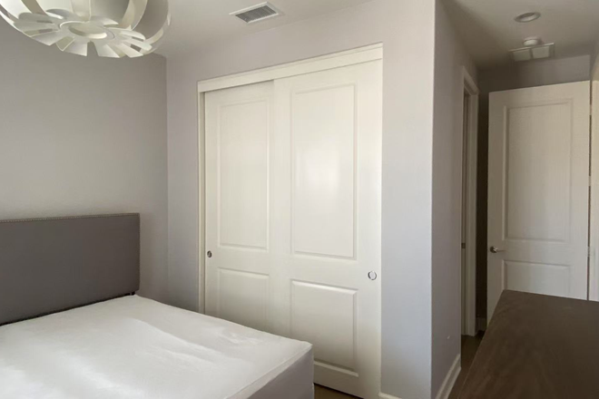 bedroom closet - A 1st floor guest room with private bath of a single-family house on a quiet and beautiful street.