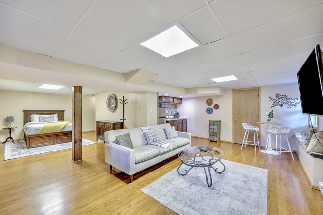 living room..open layout - Charming Lower Level studio in a quiet part of Eastside. Less than 7 minute walk to Brown Campus House