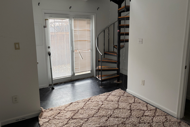 The ground floor bedroom. - *AVAILABLE NOW* Bedroom with private bathroom in two story row home