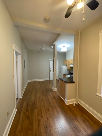 View of kitchen area from bonus area - Beautiful renovated 1 bed w/ space for dining table, heat + hw incl! Measurements + video available Apartments