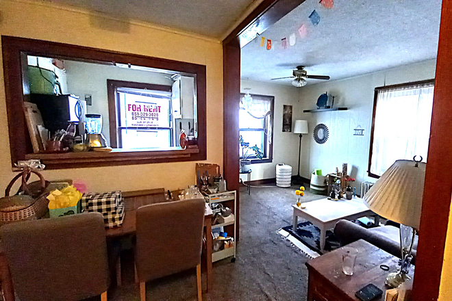 Living Room - Clean 2 Bedroom Apt Above Black Coffee at Cretin and Marshall. 3 Blocks to Campus!