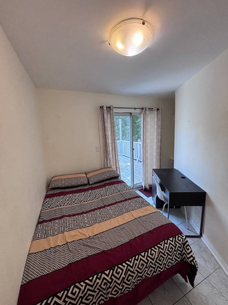 Bedroom - Fully furnished room in bright 2 bedroom unit