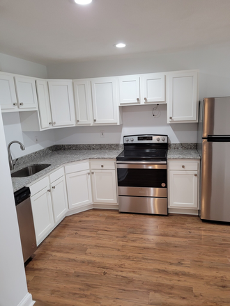 Kitchen - Gorgeous 3 bed/2 bath - Modern upgrades, granite counters, and city views! Apartments