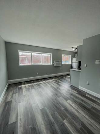 Living Space - Modern Studio with Stainless Steel Appliances! Prime Downtown Location! Apartments