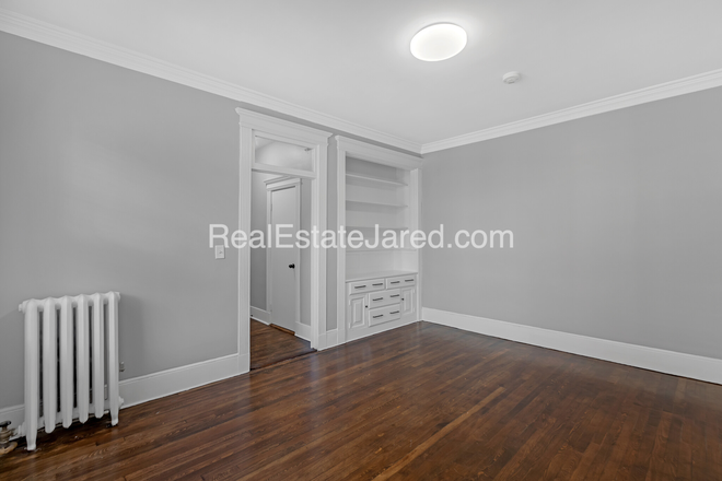 Living Room - September 1! Gorgeous renovated 4 bed on Glenville Ave! Apartments