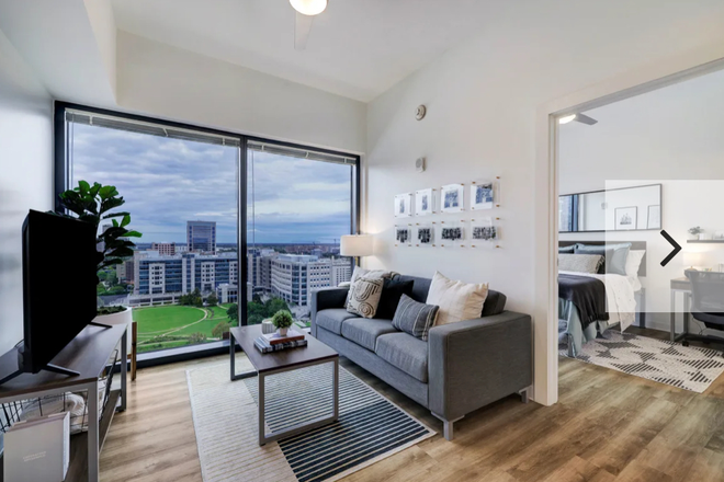 Living Room with Window View - High Rise Apartment at LifeTower