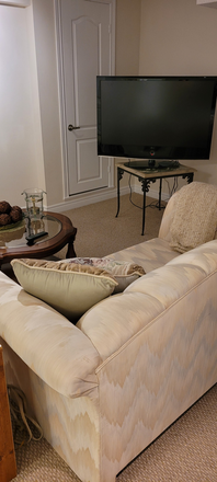 sitting area - Furnished 1 bedroom lower level of townhouse - bedroom and recreation private bathroom