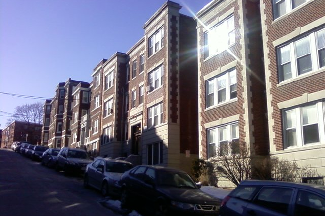 Visit hubrealtyproperties.com - Huge studio, with kitchen dining area, on green line T Apartments