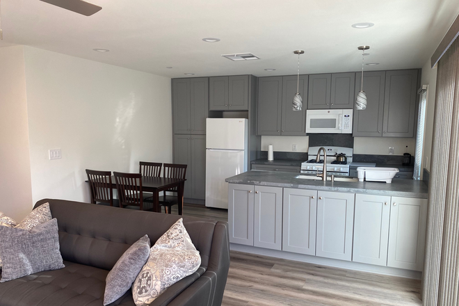 Kitchen w/frig, microwave & stove - Newly built back house with shared yard, in quiet neighborhood. Walking distance from Chapman.