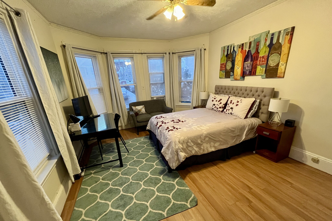 large bedroom - Furnished room 10 min walk to Northeastern, in unit laundry.
