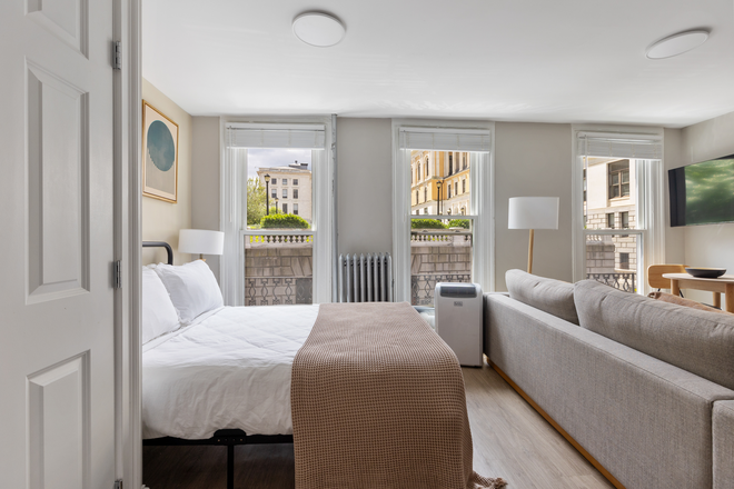 bed area - Renovated Studio directly behind State house
