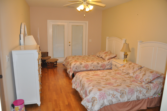 Master Bedroom - Hidden Gem: 2BR Apt at the Retreat in Riverland Woods Place