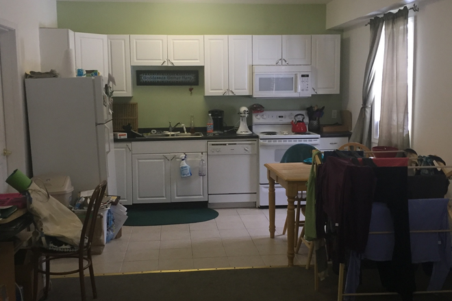 View of kitchen - Available July 1.  Large furnished studio apartment.