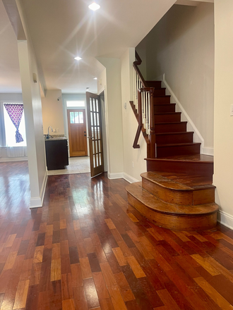 1st floor hallway - Stunning 4 Bed 4, 4 Bath Townhouse in Historic Reservoir Hill - Great Amenities Await You!