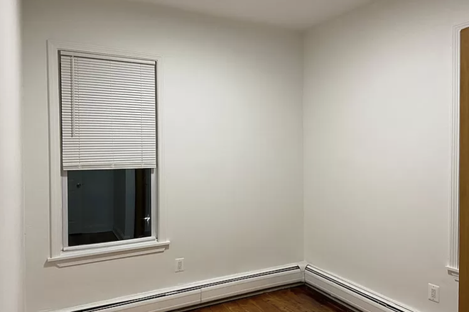 side of bedroom, window (see video for better spatial sense) - 3 bedroom (comfortable room for queen/king + desk) apartment (1.5 baths). Close to Central