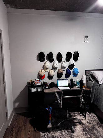 Desk and chair are provided. - TENN Student Living Apartments