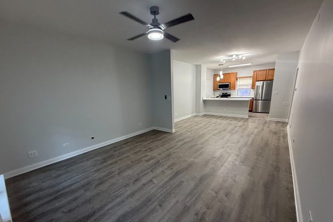 Living room + Kitchen (All New flooring, new lighting fixtures) - Just Unpack! Beautiful 2 Bed/2 Bath condo in University Village