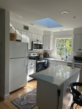 Kitchen - Furnished 2BR w/ Parking, Balcony, Utilities – Porter Sq