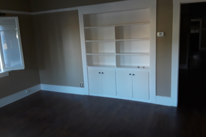 LIVING ROOM - 1 room, appliances, AC & heating, Community laundry and back yard. Apartments