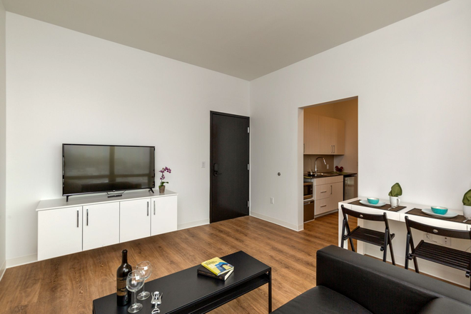 Living Room - FANTASTIC 1-Bedroom Apartments Units available Downtown Iowa City