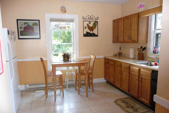 Kitchen has been updated since photo was taken: new flooring, brand new dishwasher, just painted, etc. - Large, Sunlit 2-Bedroom Apartment in Desirable Huron Village, Cambridge