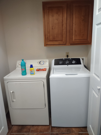 Laundry area - Great location! Near campus, downtown and walking trail. House