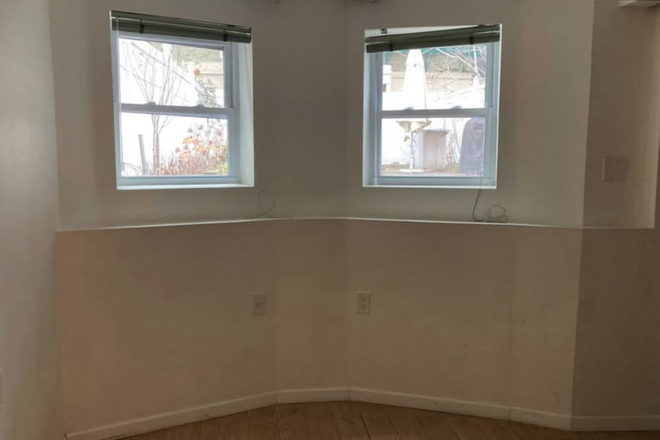 Bedroom Overlooking Backyard - NO FEE! Spacious 1-Bedroom Apartment in Bay Ridge, Brooklyn - Utilities Included!