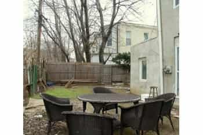 Outside seating area - 7 Bedroom  House Steps From Campus