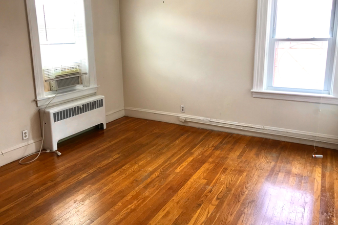 Living Room - One Bedroom Apartment. All Utilities Included. Walk 5 Blocks to Brown.