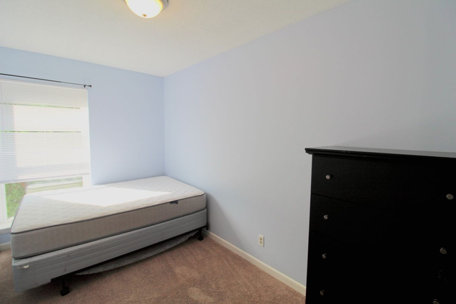 Bedroom - Live Your Best College Life at Hunters Ridge! Leasing for the 26-27 year Condo