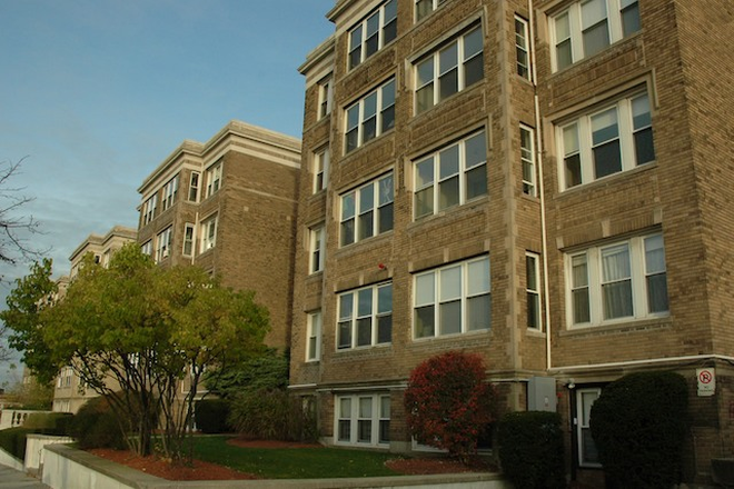 visit hubrealtyproperties.com - Brighton, spacious 2 bedroom with deck on the Washington St B line Apartments