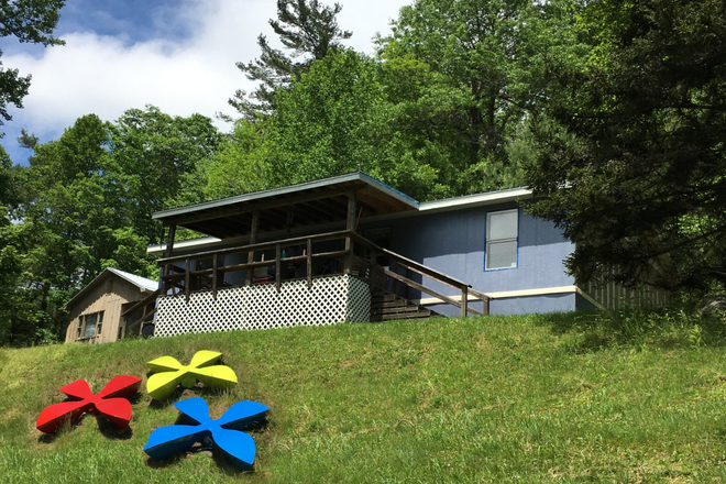 exterior with scupltures - 3BR/2BA Boone House Near App State – Partially Furnished, Great Views, Aug. 3 Move-In