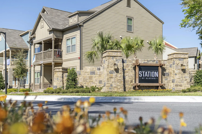 Community entrance and unit itself - The Station Alafaya Rental