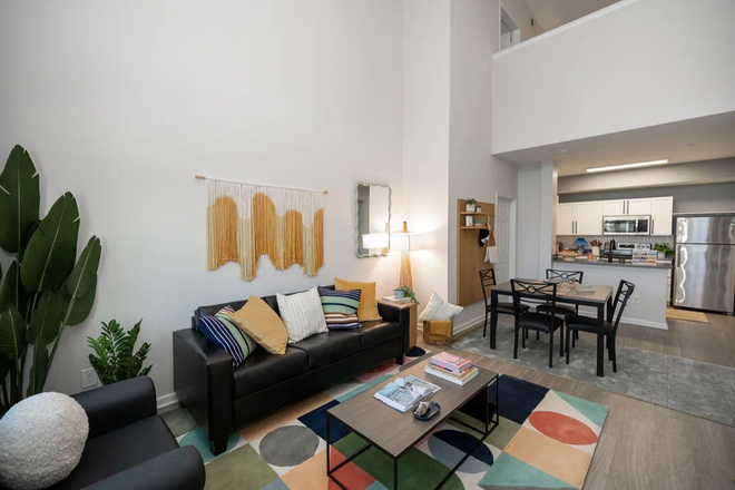 Living room and Kitchen - The Lofts 4x4 $999 and First month is on me!