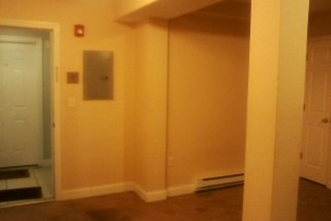 hubrealtyproperties.com - Large one bedroom, basement level, on the T in Mission Hill Apartments