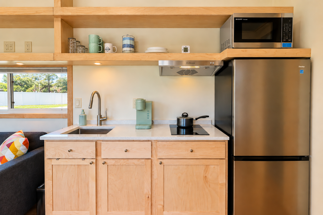 Kitchenette with Induction Cooktop and Microwave - Private Pool House in Gated Community
