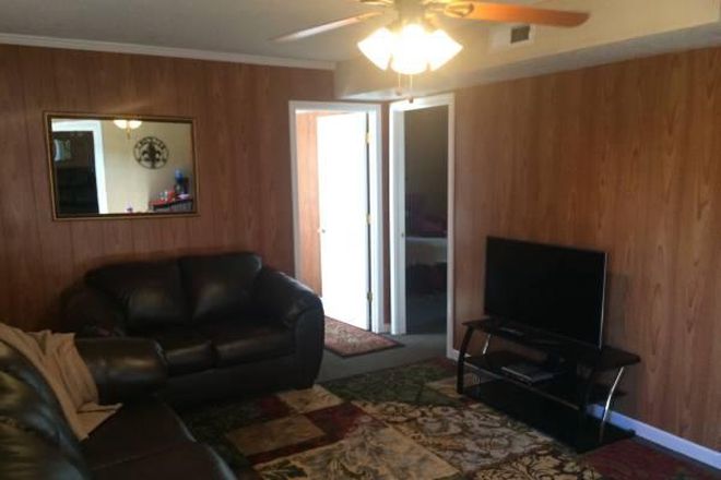 large living room with sleeper sofa - Clemson Cove Rentals offers lakeside living in rural setting across from campus and still private. Apartments