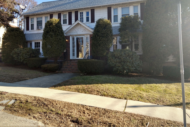 Exterior of the 2-family home. - Cozy Room in Quiet Neighborhood - Bus Direct to Harvard Sq. (Women only) Apartments