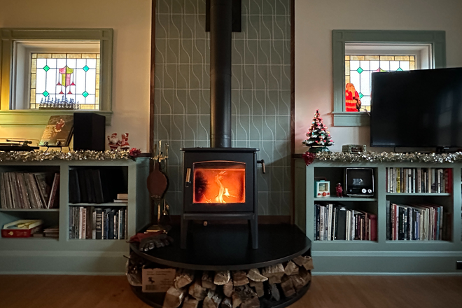 Living Room with Wood stove & Large TV to share - Lake Montebello Furnished 1 BdRm  - Shared Home