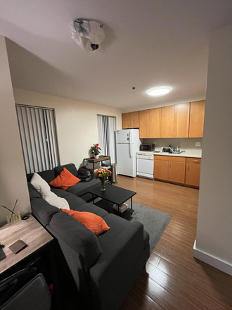 Kitchen/lounge area, separated from sleeping area. Shows part of desk - Nicely Furnished Studio Apartment, 1 Western Ave, HBS campus, Winter