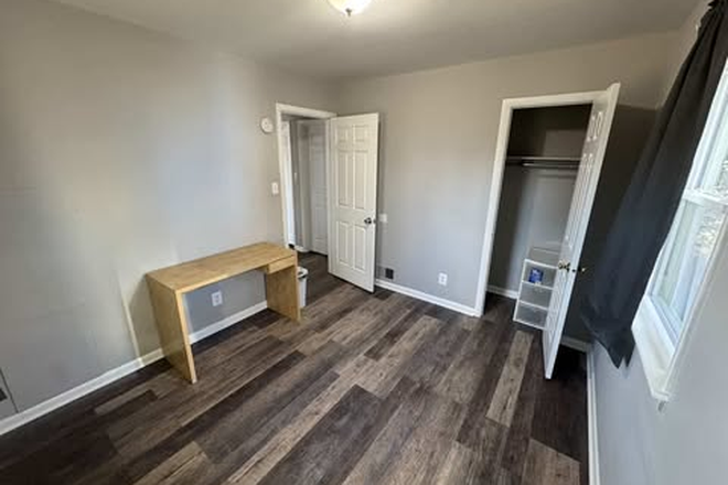  - Room in house walking distance to campus.