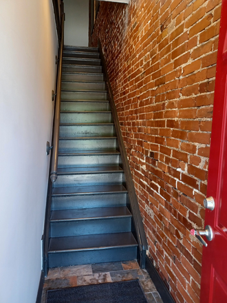 front door entry - Grove Townhouse Apartment