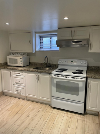 Kitchen - Spotless, clean 2 bedroom basement apartment - great neighbourhood - On subway route
