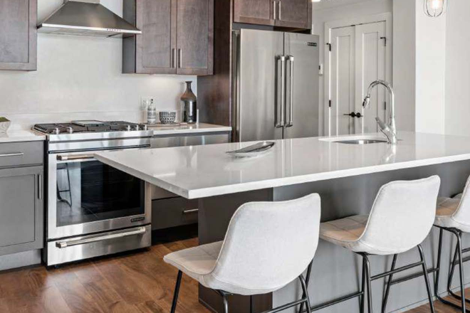 1 - New Construction, steps from the Commuter Rail, NO FEE, 9/1, Garage Parking, low deposits