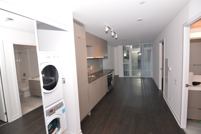 Main living space - taken by front door - 1 Bedroom + Den with Balcony near Yonge and College Condo