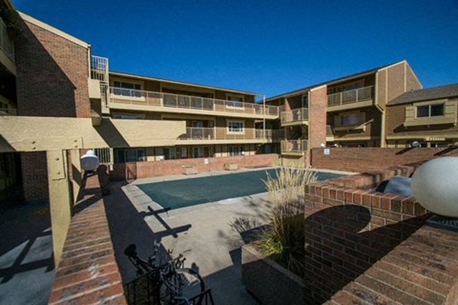 Pool, part of the apartment complex. - Wimbledon Condominiums