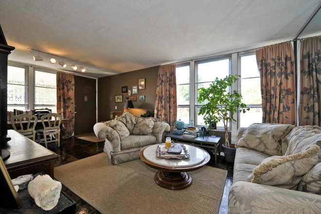 spacious living room with great view of West End - Beautiful West End Loft Condo