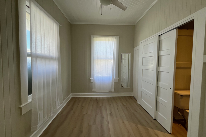View towards bathroom and storage closets - Renovated Manoa Studio for Rent Immediately