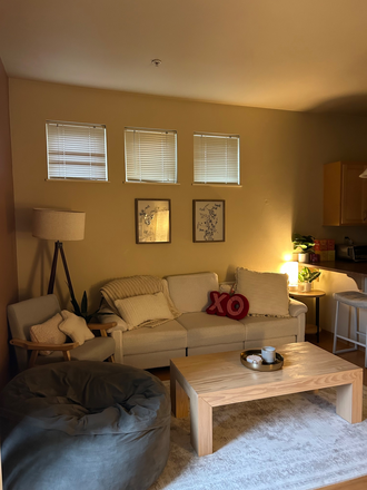 Living room - Looking for a fourth girl to live in our cute place at The Waverly, close to campus! Townhome