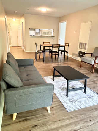Living Room - Room with Private Bathroom - Condo at University Commons 303 Smith Level Road